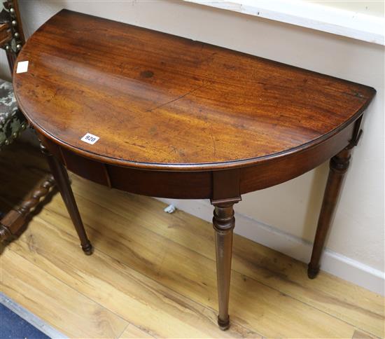 A pair of Georgian style mahogany demi-lune console tables, W.3ft